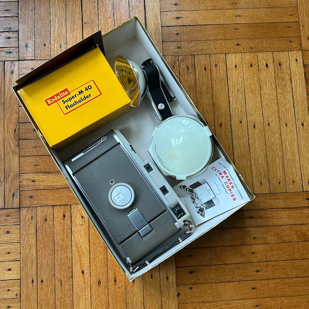 Vintage Polaroid Land Camera 150, Diffuser, Flash Kit and Original Manuals
